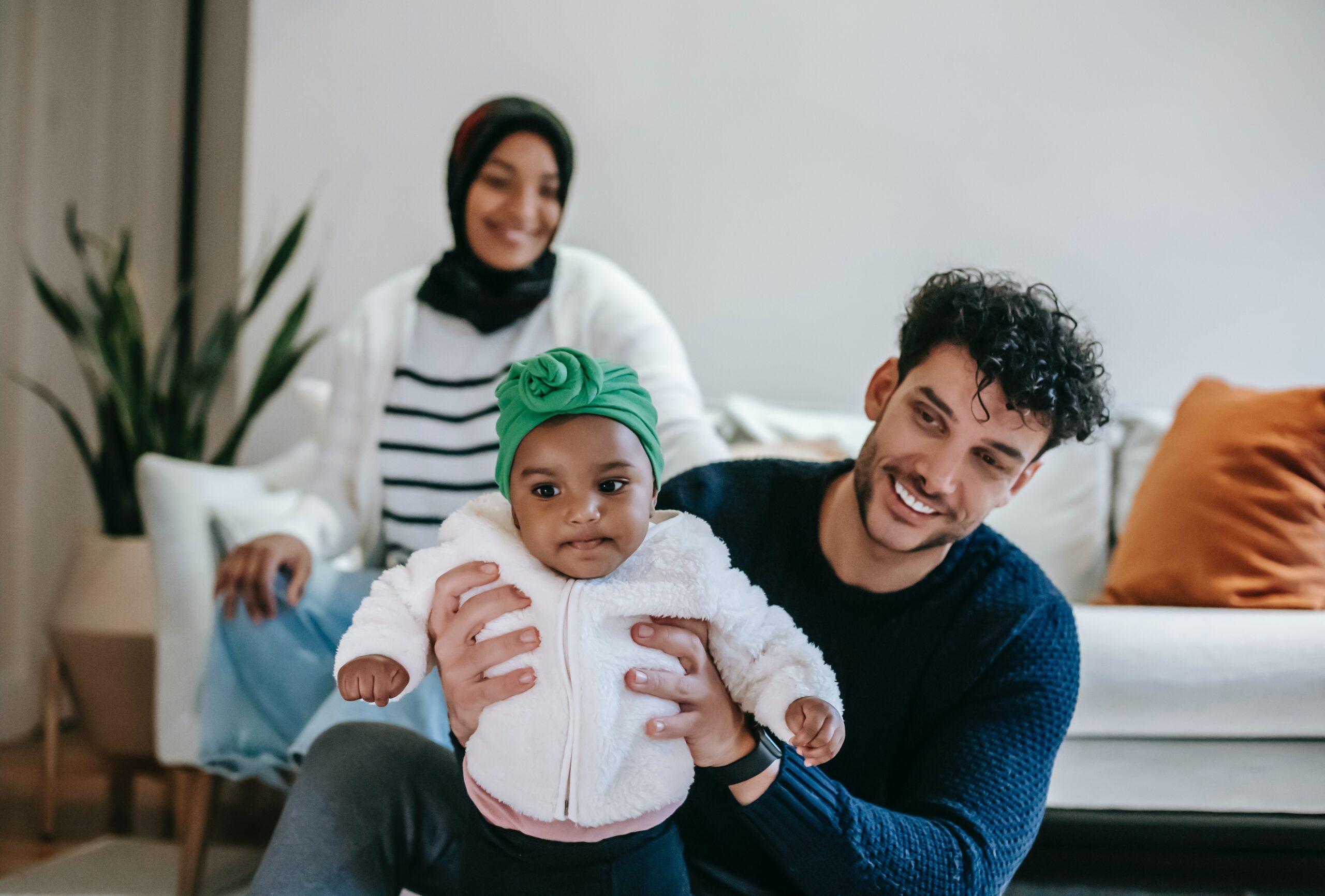 Ethnically diverse family with baby